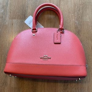 Brand new with tags, coral coach mini bag